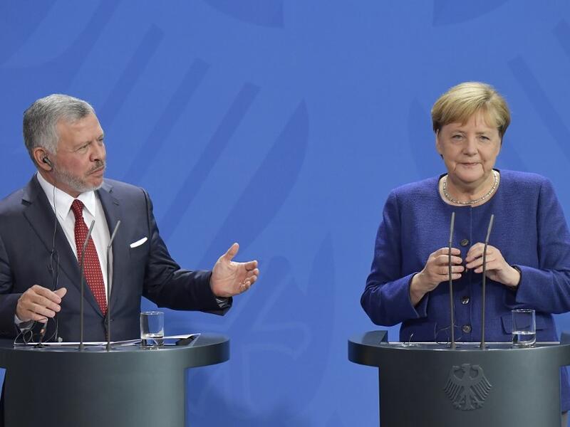 German Chancellor Angela Merkel and King Abdullah II of Jordan give a joint press conference following talks on economic issues and the bilateral relationship of their two countries on September 17, 2019 at the Chancellery in Berlin. Tobias SCHWARZ / AFP