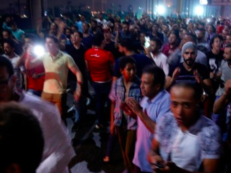 Egyptian protesters shout slogans as they take part in a protest calling for the removal of President Abdel Fattah al-Sisi in Cairo's downtown on September 20, 2019 (AFP Photo)