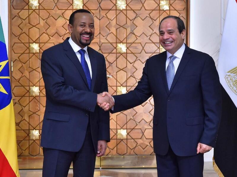 Egyptian President Abdel Fattah Al Sisi (R) and Prime Minister of Ethiopia Abiy Ahmed (L). (AFP/ File Photo)