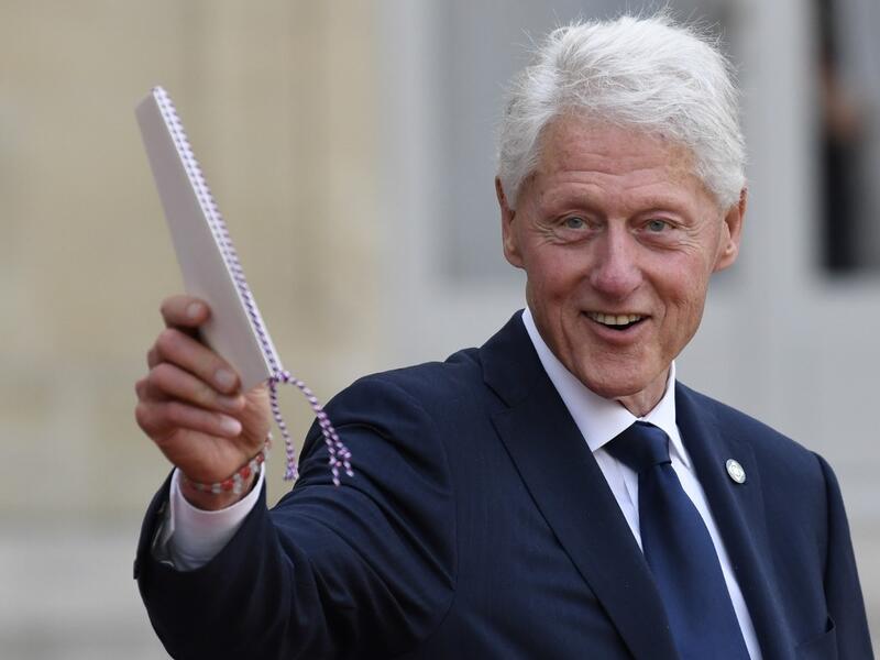 Former US President Bill Clinton gestures as he leaves The Elysee Presidential Palace in Paris on September 30, 2019, following a luncheon after a church service for former French President Jacques Chirac. Former French President Jacques Chirac died on September 26, 2019 at the age of 86. Bertrand GUAY / AFP