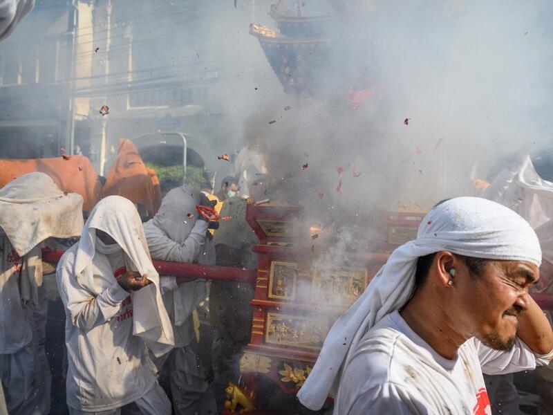 The festival begins on the first evening of the ninth lunar month and lasts for nine days, with many religious devotees slashing themselves with swords, piercing their cheeks with sharp objects and committing other painful acts to purify themselves, taking on the sins of the community. Mladen ANTONOV / AFP