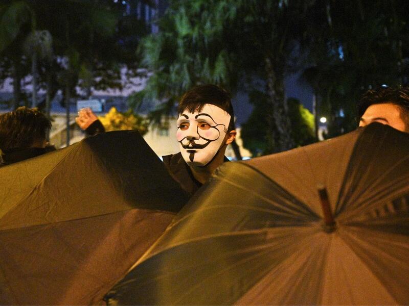 A protester wearing a mask takes part in a protest in the Wanchai district in Hong Kong on October 4, 2019, after people hit the streets when the government earlier announced a ban on facemasks. (AFP/ File Photo)