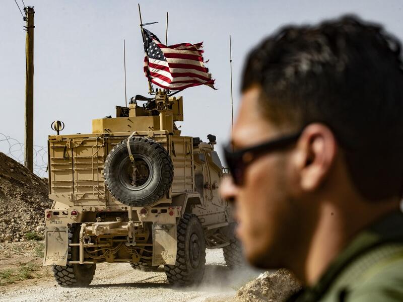 US forces in Syria started pulling back today from Turkish border areas, opening the way for Ankara's threatened military invasion and heightening fears of a jihadist resurgence. (Delil SOULEIMAN / AFP)