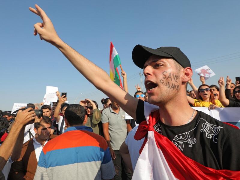 A Kurdish man shouts slogans during a demonstration in Arbil, the capital of the northern Iraqi Kurdish autonomous region (AFP)