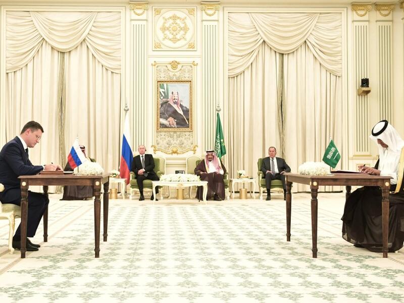 Russian Energy Minister Alexander Novak and Saudi Energy Minister Abdulaziz Bin Salman sign documents during a ceremony following a meeting of Russian President Vladimir Putin with Saudi Arabia's King Salman in Riyadh, Saudi Arabia, on October 14, 2019. Alexey NIKOLSKY / SPUTNIK / AFP