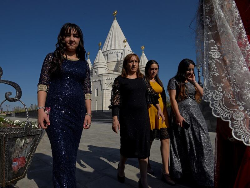 The new Yazidi Temple in the village of Aknalich, 35 kilometres from the Armenian capital Yerevan, on October 11, 2019 Worshippers kiss the marble walls and gaze at an ornate peacock inlaid with multi-coloured stones inside the world's largest Yazidi temple, which has opened in Armenia.  KAREN MINASYAN / AFP