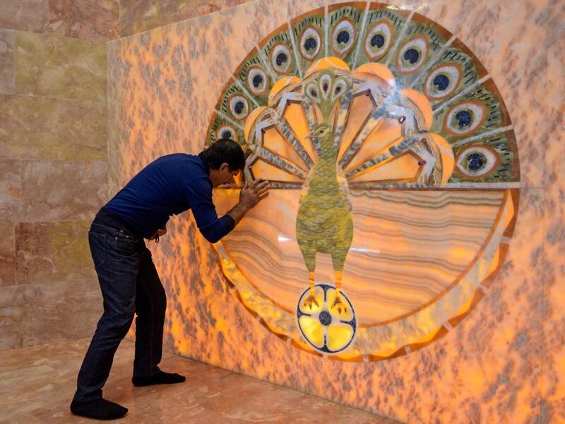 Yazidis have a community of around 35,000 in Armenia, where they are able to freely practise their religion. They also live in Syria, Turkey and Iraq. Yazidis worship one God, who, they believe, created the world and entrusted it to seven Holy Beings, the most important of which is Melek Taus, or the Peacock Angel.  KAREN MINASYAN / AFP