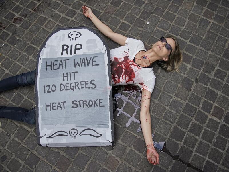 Environmental activists participate in a die-in during a rally for action against climate change in the Financial District October 7, 2019 in New York City. Drew Angerer / GETTY IMAGES NORTH AMERICA / AFP
