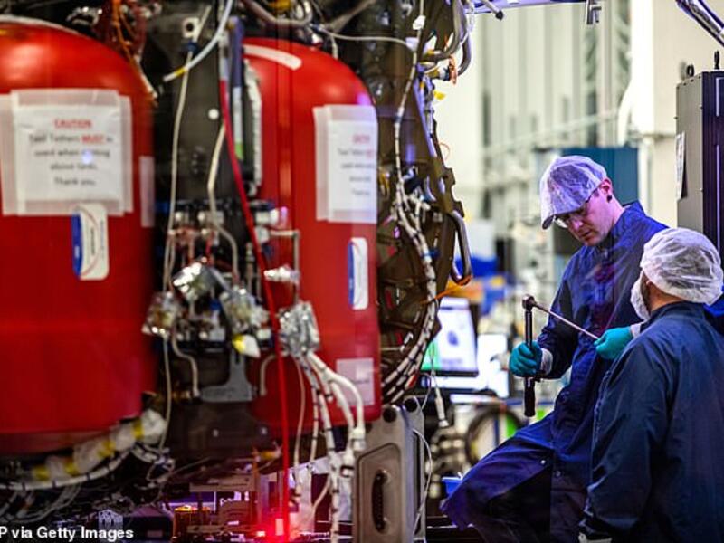 Employees of SpaceX work on the Crew Dragon reusable spacecraft. (AFP/ File Photo)