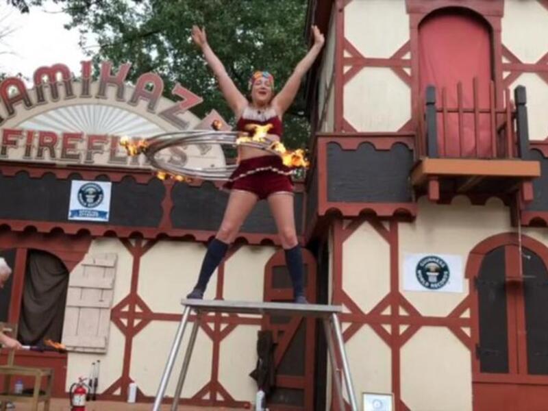 Casey Martin broke a Guinness World Record by spinning five flaming hula hoops. (Twitter) Casey Martin broke a Guinness World Record by spinning five flaming hula hoops. (Twitter)