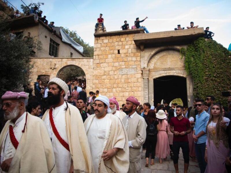Yezidi women and men work Voluntarily to serve this holy site (Twitter)