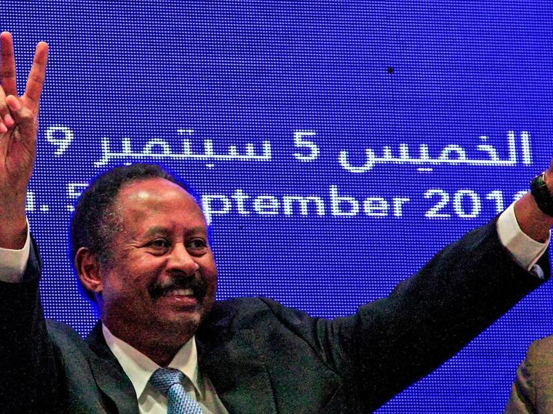 Sudan's Prime Minister Abdalla Hamdok flashes the victory sign during a press conference to unveil his cabinet in Khartoum on September 5, 2019. (AFP/ File Photo)