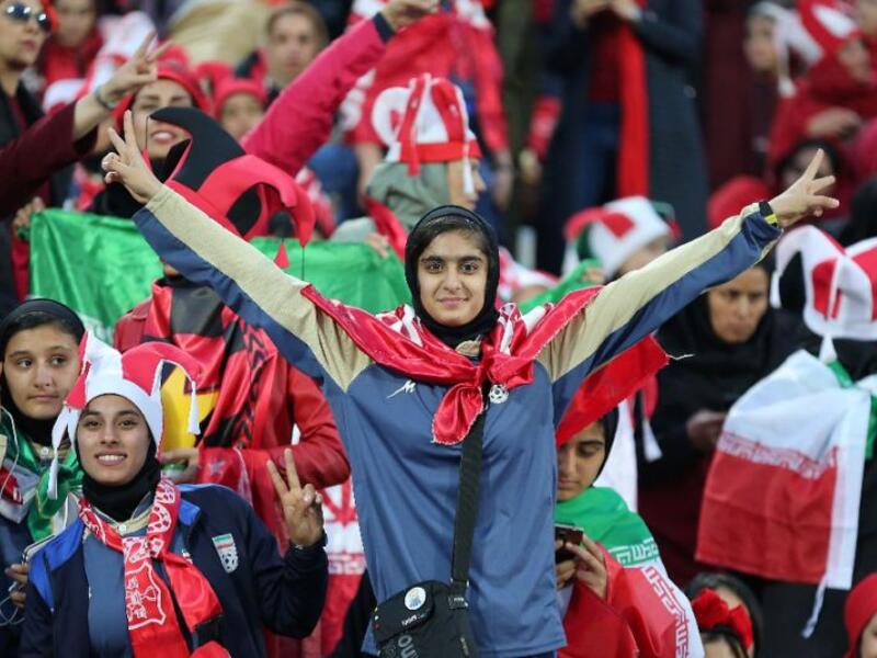 Iranian female fans cheer for their team during the second leg of the AFC Champions League final football match between Iran's Persepolis and Japan's Kashima Antlers on November 10, 2018, at the Azadi Stadium in Tehran (AFP /ATTA KENARE)