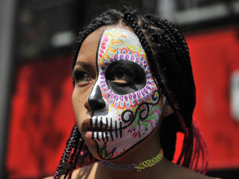 A woman dressed as Catrina takes part in the Catrinas Parade along Reforma Avenue in Mexico City  Claudio Cruz / AFP / Getty