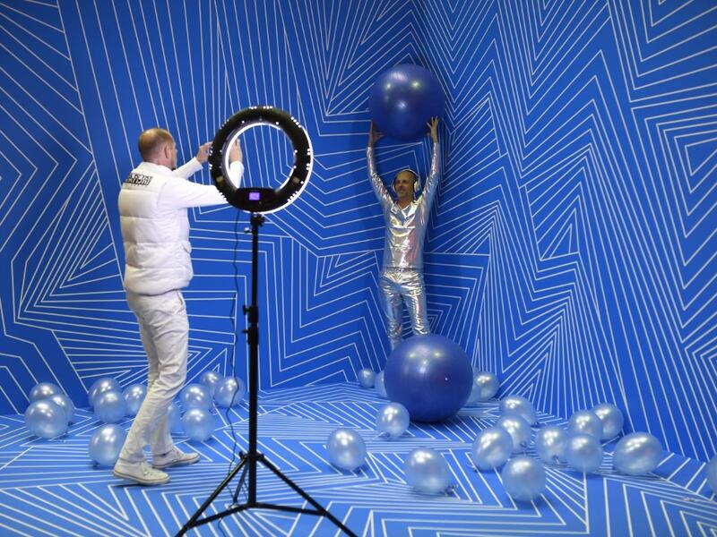 Manfred Dederl (R) is being photographed at the "Supercandy Pop-Up Museum Vol. 2" in Cologne, western Germany on November 1, 2019. It is an interactive museum and offers the perfect photo backdrop for social media at 25 stations. INA FASSBENDER / AFP