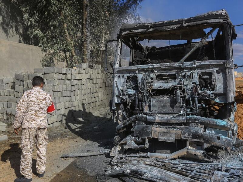 This picture taken on November 18, 2019 shows the aftermath of a reported air strike on a factory south of the Libyan capital Tripoli where several people were killed according to a spokesman of the UN-recognised Government of National Accord (GNA). (Mahmud TURKIA / AFP)