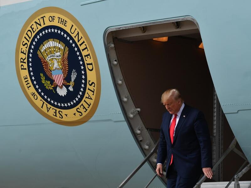 US President Donald Trump steps off Air Force One upon arrival at Austin–Bergstrom International Airport in Austin, Texas on November 20, 2019. Trump is in Austin to tour an Apple computer manufacturing facility where the Mac Pro is assembled. (MANDEL NGAN / AFP)