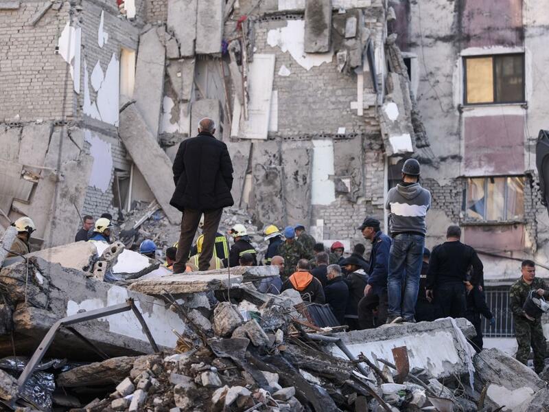 Rescue workers remove debris from a collapsed building in Thumane, northwest of capital Tirana, after an earthquake hit Albania, on November 26, 2019. (AFP/ File Photo)