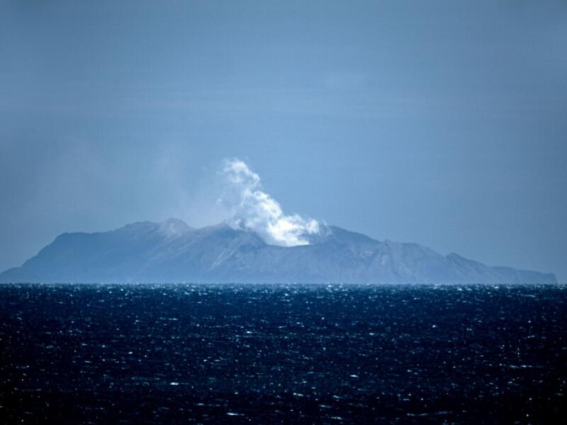 Steam rises from the White Island volcano in Whakatane on December 10, 2019, after a volcanic eruption the day before. New Zealand's Prime Minister Jacinda Ardern expressed "unfathomable grief" on December 10 after a volcanic eruption on a popular tourist island that is thought to have claimed 13 lives. Marty MELVILLE / AFP