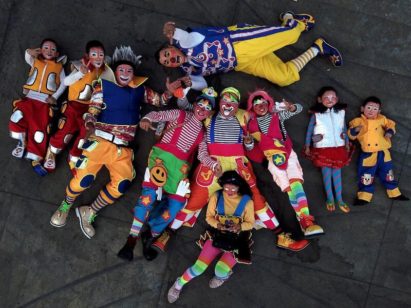 Clowns pose for a picture during the International Clown Day in Guadalajara, Mexico, on December 10, 2019. ULISES RUIZ / AFP