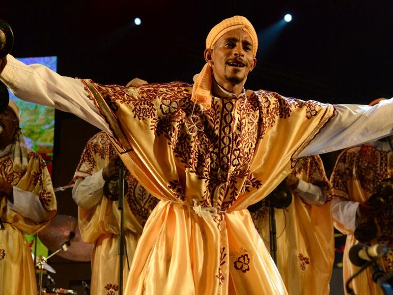 In this file photo taken on June 14, 2014 a member of Gnaoua (Gnawa) group Maalem Mohamed Kouyou performs in Essaouira at the Gnaoua World Music Festival. Gnawa culture, a centuries-old Moroccan practice rooted in music, African rituals and Sufi traditions, was on December 12, 2019 added to UNESCO's list of Intangible Cultural Heritage of Humanity. Fadel SENNA / AFP