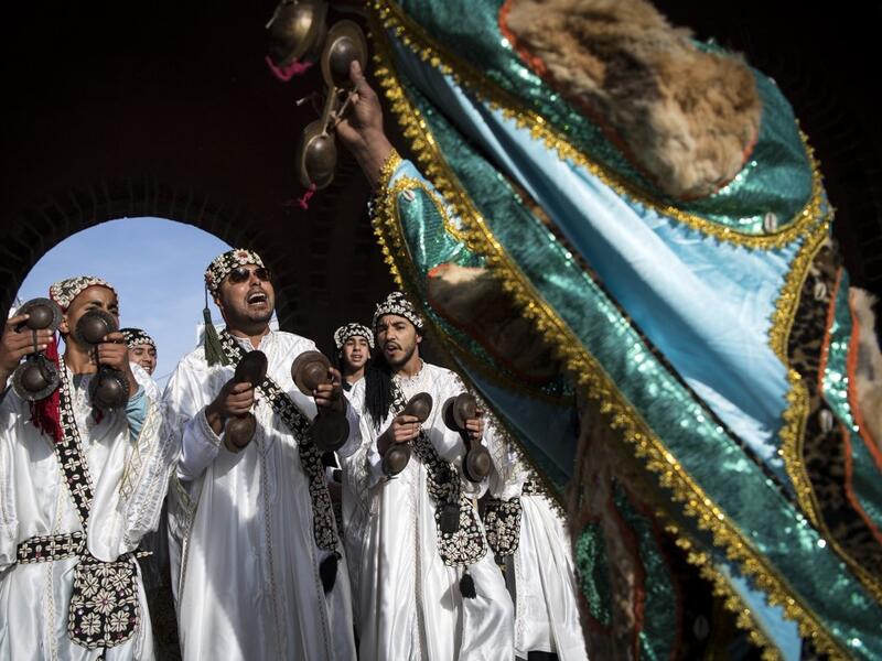 Gnawa refers to a "set of musical productions, fraternal practices and therapeutic rituals where the secular mixes with the sacred", according to the nomination submitted by Morocco. Often dressed in colourful outfits, Gnawa musicians play the guenbri, a type of lute with three strings, accompanied by steel castanets called krakebs. FADEL SENNA / AFP