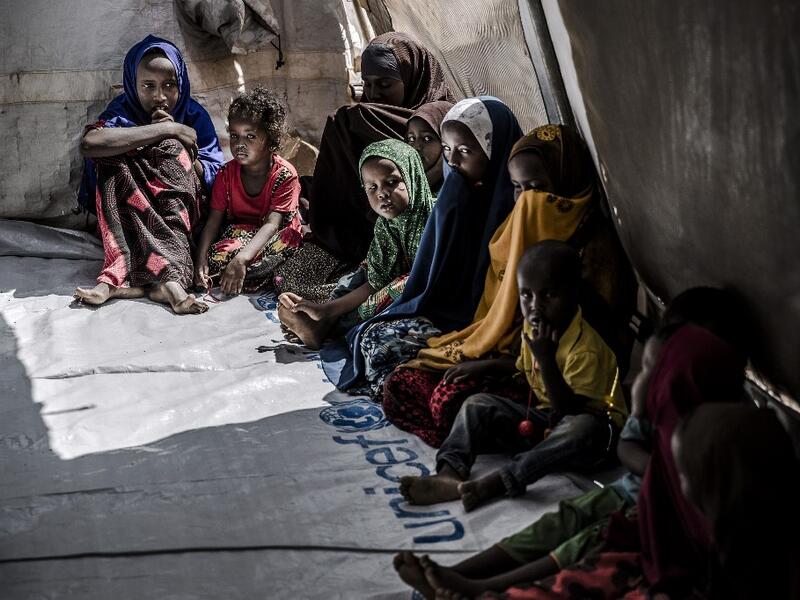 A group of displaced children, who were forced to leave their houses due to heavy rains and floods in the area, gather while attending activities for children in an United Nations tent at a displacement camp for families affected by floods located in Beledweyne, Somalia, on December 14, 2019. The rains have inundated big areas surrounding Beledweyne area forcing thousands of people to leave their houses and look for humanitarian assistance while living in displacement camps. Due to climate change and human 