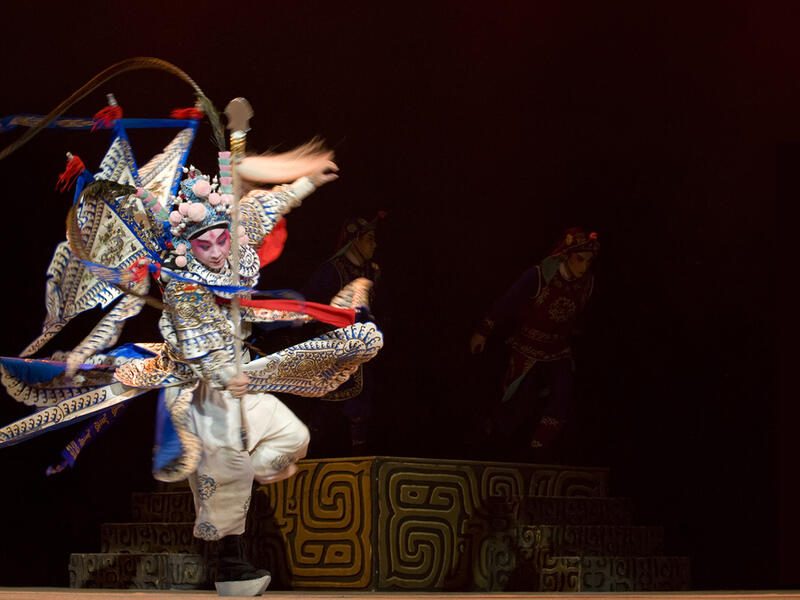 Chinese opera actor performs traditional drama onstage (Shutterstock)