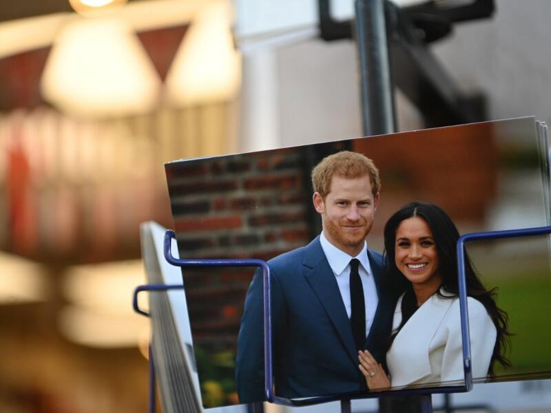 Royal memorabilia featuring Britain's Prince Harry, Duke of Sussex, and Meghan, Duchess of Sussex is displayed for sale in a store near Buckingham Palace in London on January 10, 2020. Prince Harry's wife Meghan has returned to Canada following the couple's bombshell announcement that they were quitting their frontline royal duties, it emerged Friday, as the monarch held urgent talks with her family to resolve the crisis. DANIEL LEAL-OLIVAS / AFP