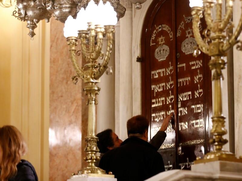 Guests visit the newly renovated Eliyahu Hanavi synagogue in the northwestern Egyptian city of Alexandria on January 10, 2020, on the day of its inauguration. The synagogue, boasting green and violet stained glass windows and towering marble columns, was built in its current form in 1850 by an Italian architect on top of the original edifice dating back to 1354. Khaled DESOUKI / AFP
