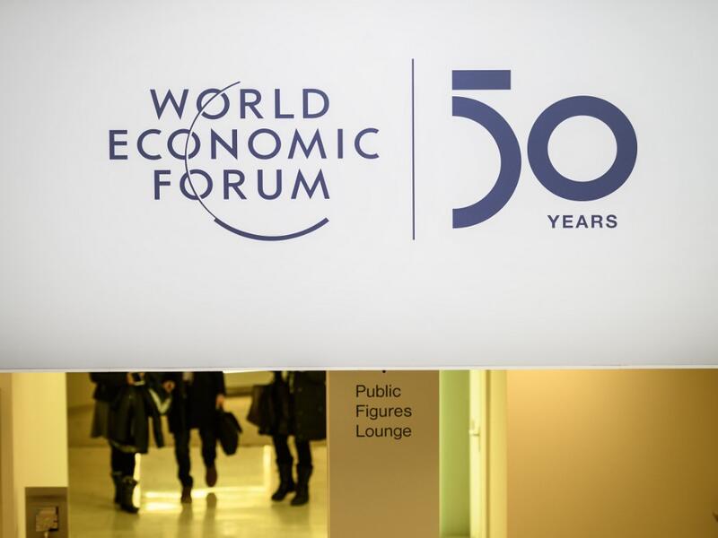 A sign is seen inside the Congress center ahead of the annual meeting of the World Economic Forum (WEF) on January 20, 2020 in Davos. Fabrice COFFRINI / AFP