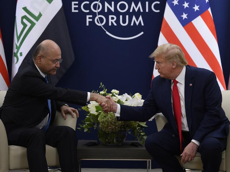 US President Donald Trump speaks with Iraqi President Barham Salih during a bilateral meeting at the World Economic Forum in Davos, Switzerland, on January 22, 2020. JIM WATSON / AFP