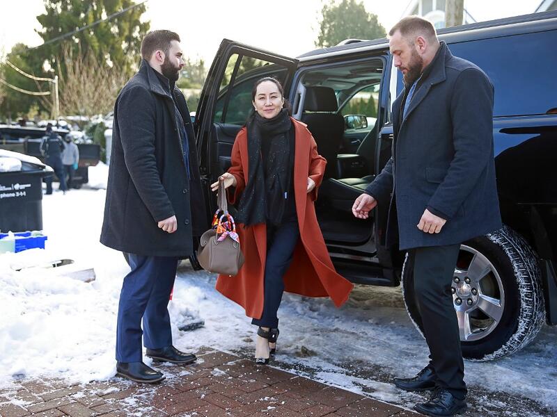 Huawei Technologies Chief Financial Officer Meng Wanzhou exits her vehicle at her home after her court appearance on January 17, 2020 in Vancouver, Canada. The United States government accused Wanzhou of fraud after HSBC continued trade with Iran while sanctions were in place. Jeff Vinnick/Getty Images/AFP