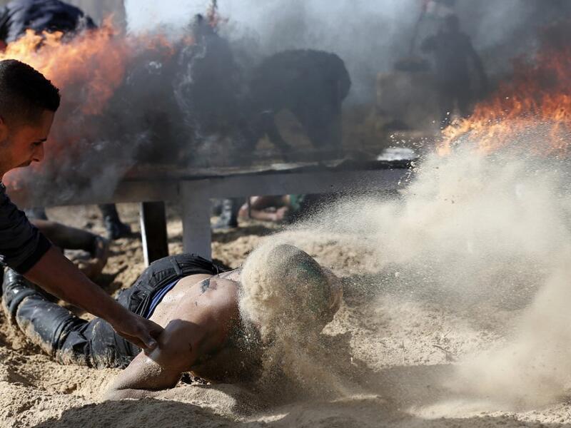 Palestinian police cadets take part in a training session at a police academy in Khan Yunis, in the southern Gaza Strip on February 6, 2020. MAHMUD HAMS / AFP