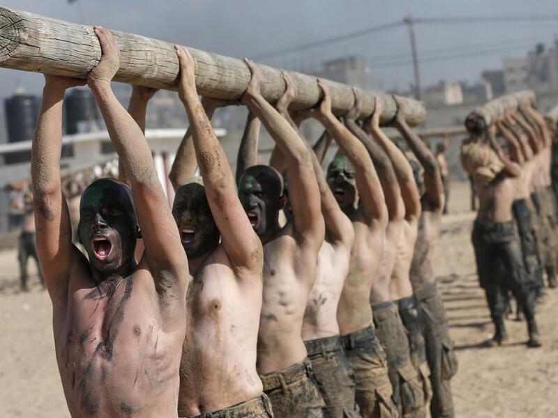 Palestinian police cadets take part in a training session at a police academy in Khan Yunis, in the southern Gaza Strip on February 6, 2020. MAHMUD HAMS / AFP