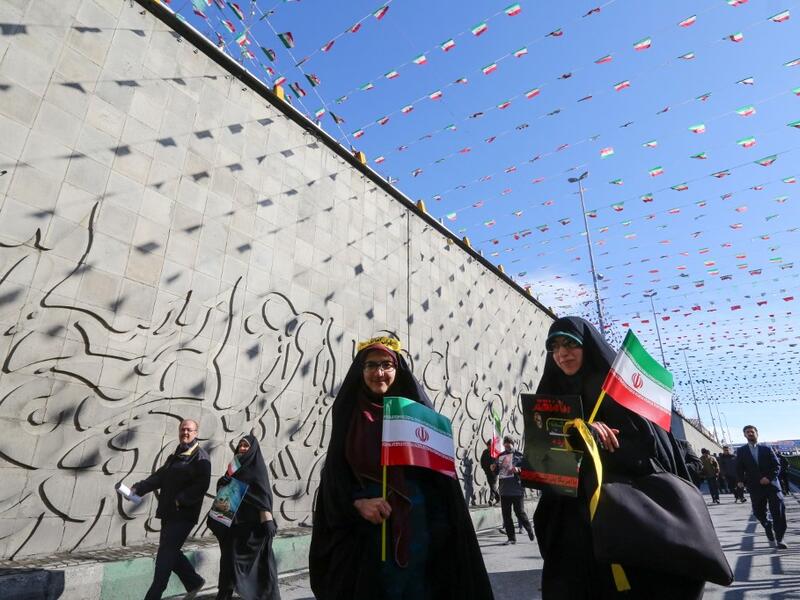 Iranians attend commemorations marking 41 years since the Islamic Revolution in the capital Tehran's Azadi Square on February 11, 2020. Thousands of Iranians massed for commemorations marking 41 years since the Islamic Revolution, in a show of unity at a time of heightened tensions with the United States. The celebrations mark the day that Shiite cleric Khomeini returned from exile and ousted the shah's last government. ATTA KENARE / AFP