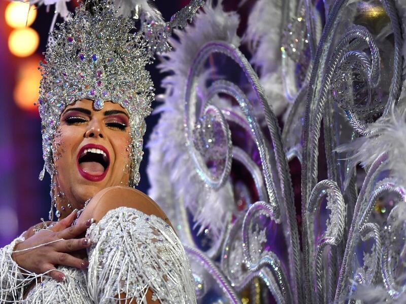 A participant presents her outfit during the Queen of the Carnival pageant contest in Santa Cruz de Tenerife, on the Spanish Canary island of Tenerife, on February 19, 2020. Gabriel BOUYS / AFP