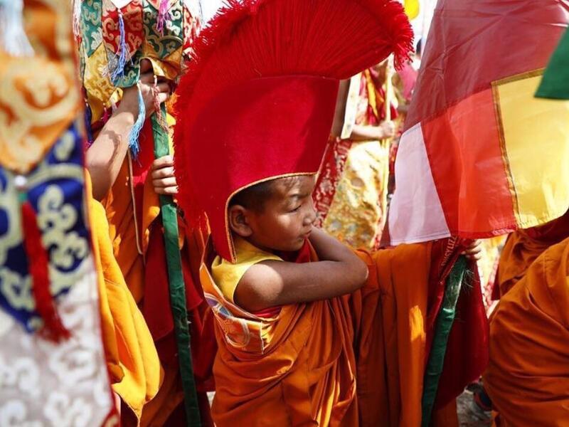 Exiled Tibetan performers sing and dance during celebrations marking the third day of the Lhosar Tibetan New Year in Kathmandu at the Boudhanath Stupa area (Twitter)