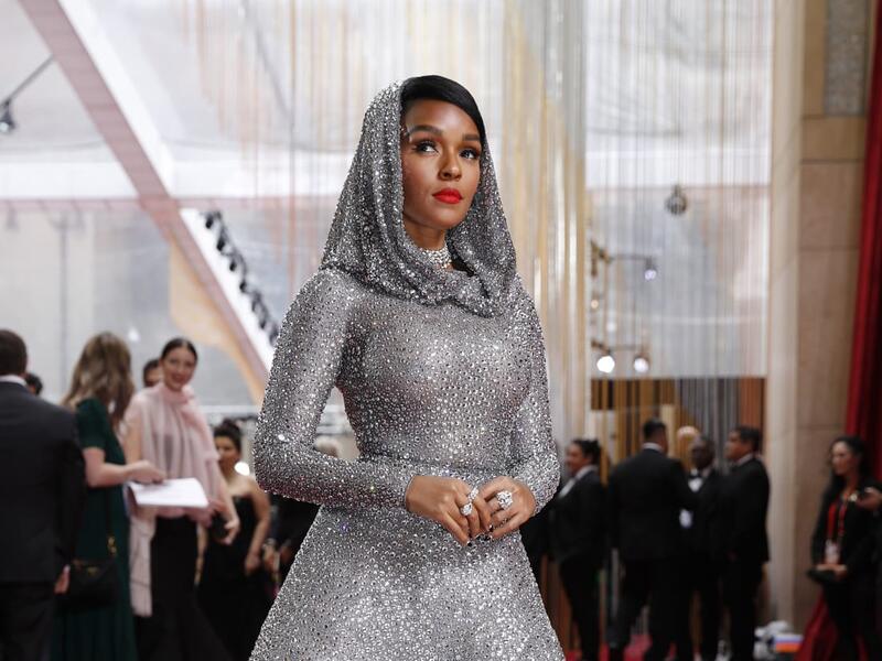 Janelle Monae dazzled in a glittering silver-hooded dress by Ralph Lauren