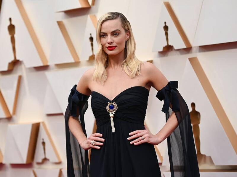 Margot Robbie stepped out in a vintage strapless navy Chanel dress
