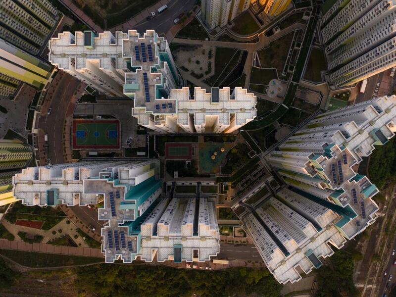 This aerial photograph taken on April 29, 2019 shows a housing estate in Hong Kong. DALE DE LA REY / AFP