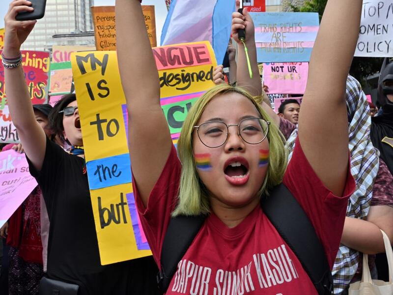 Indonesian people march to mark the International Women’s Day in Jakarta on March 8, 2020. ADEK BERRY / AFP