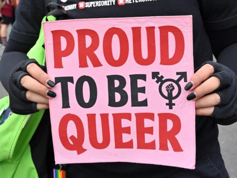 An Indonesian woman holds a banner to mark the International Women’s Day in Jakarta on March 8, 2020. ADEK BERRY / AFP