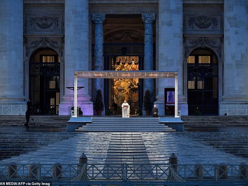 Pope Francis presided over a moment of prayer on the sagrato, accompanied only by one other priest and television crews broadcasting his message to Italy and the rest of the world. (AFP/File)