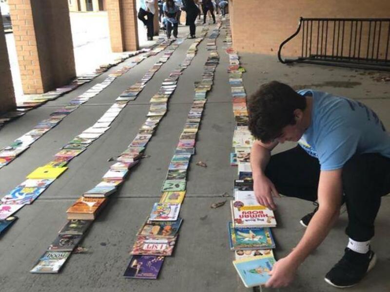 A New York state nonprofit broke a Guinness World Record by creating a line of books measuring 3.81 miles long. Photo courtesy of The Book Fairies