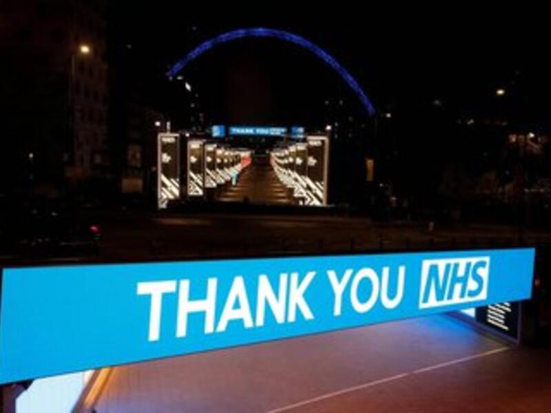 UK landmarks lit up blue for the NHS staff fighting coronavirus. (Twitter)
