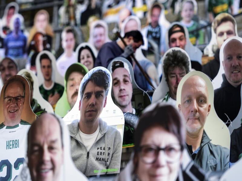 In this file photo taken on April 16, 2020 Cardboard cut-outs with portraits of Borussia Moenchegladbach's supporters are seen at the Borussia Park football stadium in Moenchengladbach, western Germany, amid the novel coronavirus COVID-19 pandemic. German football authorities are set to announce plans on April 23, 2020 for Bundesliga matches to restart on May 9 in empty stadiums, but the potential return in the midst of the coronavirus pandemic is meeting some opposition. Ina FASSBENDER / AFP