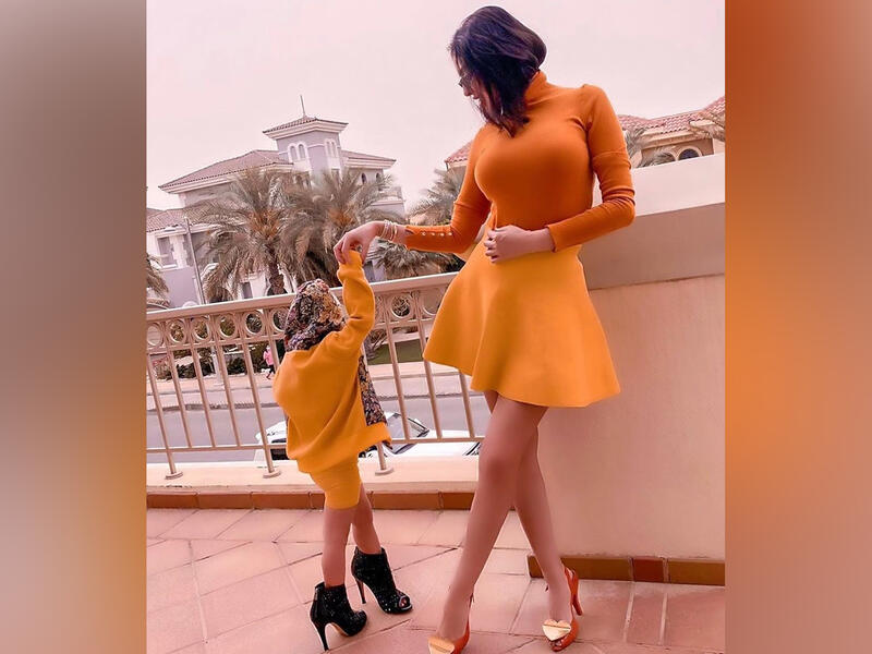 Maryam Hussein posing with her daughter