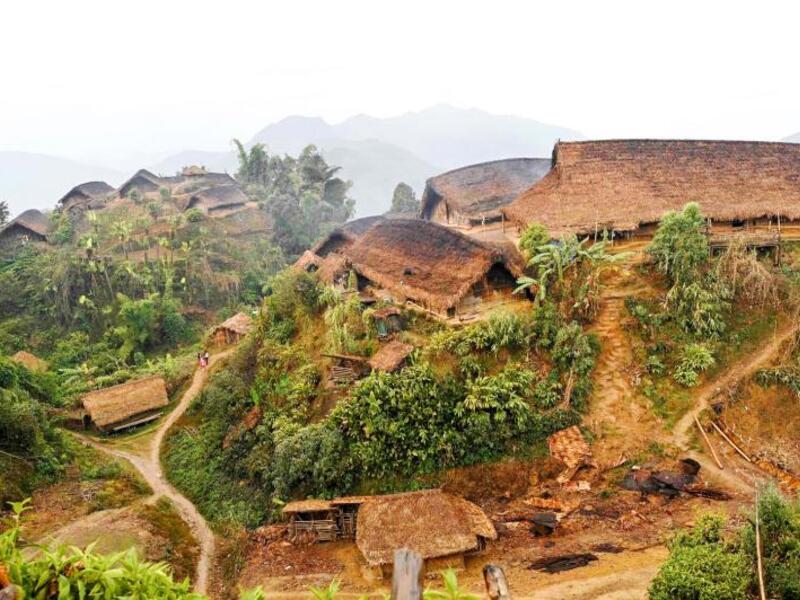 This photo taken on February 9, 2020 shows a general view of Karmawlawyi village in Myanmar's Sagaing region, near the border with India. The king of the Konyak tribe sleeps in Myanmar, but eats in India -- his house, village and people divided by a mountain border which serves as a vulnerable lifeline now severed by a coronavirus lockdown.  Ye Aung THU / AFP