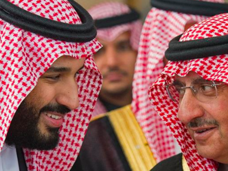 A file photo showing Mohammed bin Salman (L) and Mohammed bin Nayef (R) [Bandar al-Jaloud/Saudi Royal Palace/AFP]